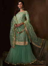Load image into Gallery viewer, Phenomenal Pale Green Soft Net Festive Wear Sharara Suit
