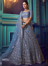 Load image into Gallery viewer, Phenomenal Cloudy Grey Soft Net Base Designer Wedding Lehenga Choli
