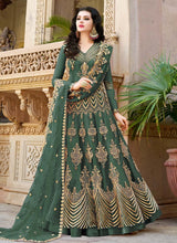 Load image into Gallery viewer, marvelous partywear green traditional look heavy gown
