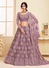 Load image into Gallery viewer, Violet Soft net and stone base partywear lehenga choli
