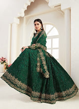Load image into Gallery viewer, Order Gorgeous bottle green colored soft net base lehenga choli
