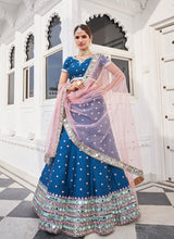 Load image into Gallery viewer, azure blue outstanding weddingwear mirror work embroidered lehenga choli
