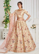 Load image into Gallery viewer, ivory cream colored thread work with sequins silk base lehenga choli
