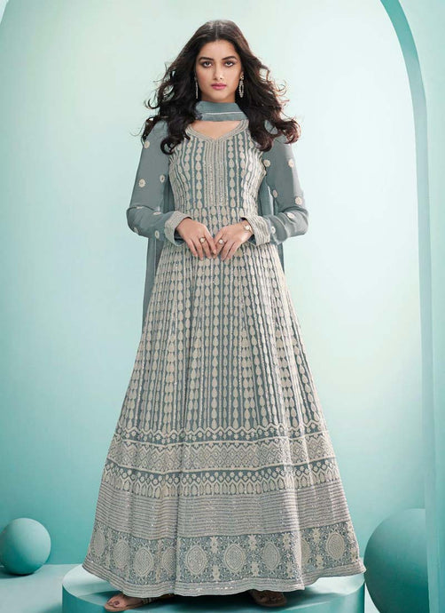 trending pastel grey colored lucknowi work georgette base gown