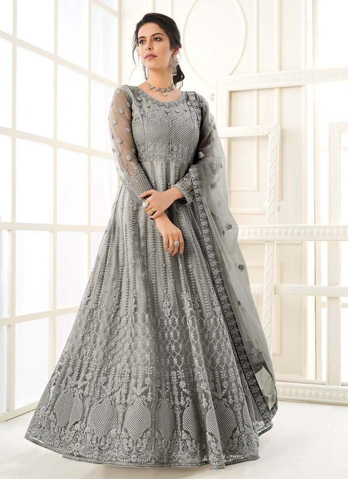 staggering Zari worked steel grey colored soft net base designer gown