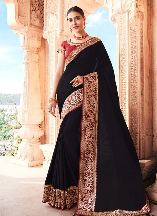 traditional wear black colored silk weave designer saree