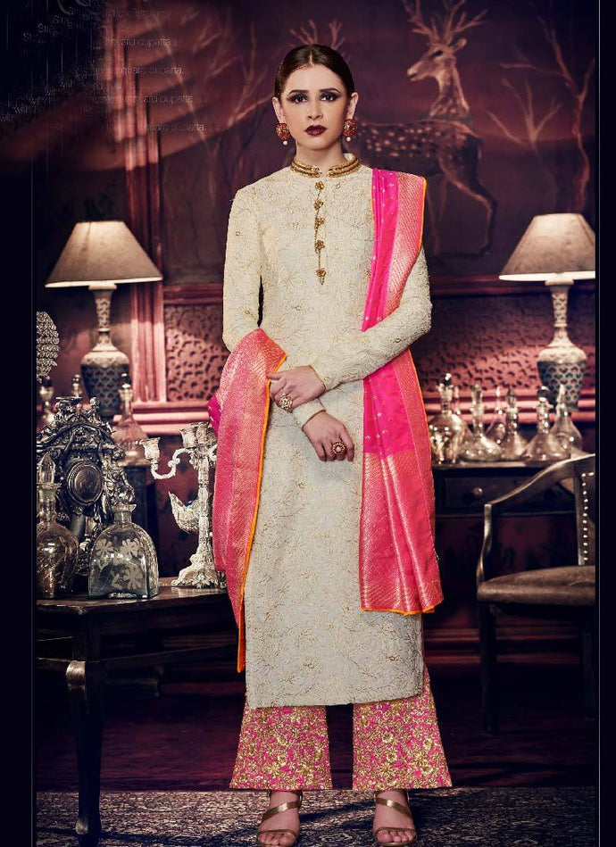 ravishing off-white color silk base  straight suit style salwar kameez