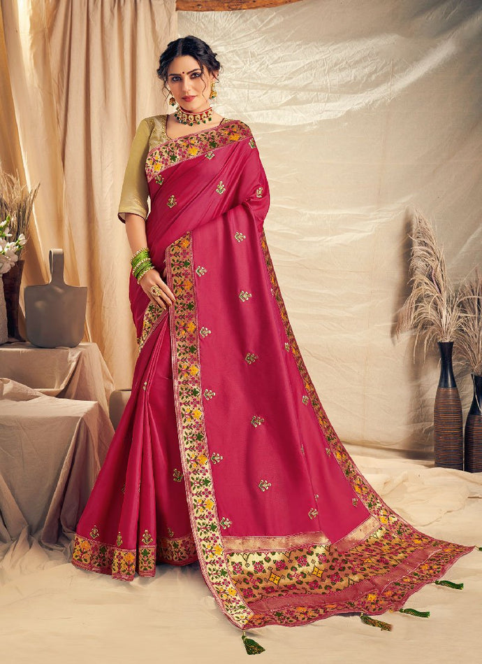 Fantastic Hot pink colored embroidered silk base saree
