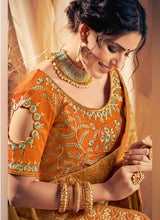 Load image into Gallery viewer, Auspicious orange silk base saree with designer blouse
