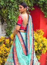 Load image into Gallery viewer, buy Glamorous Turquoise color Silk base Lehenga Choli with Zari-Resham work

