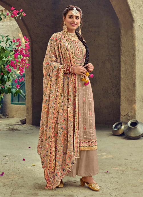 beige traditional wear heavy embroidered georgette base Punjabi suit
