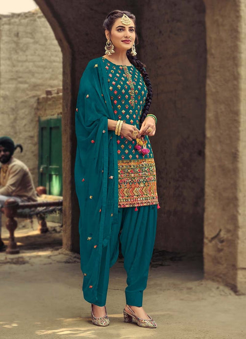 Graceful looking teal green color traditional look Punjabi salwar suit
