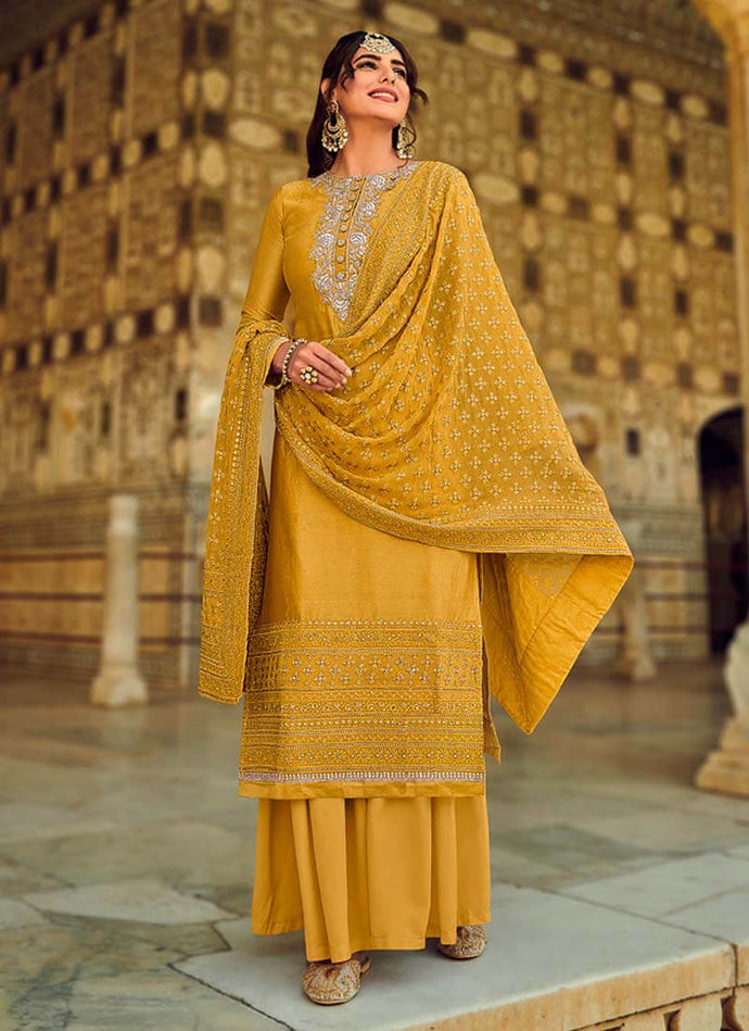 Mustard sharara suit with Zari and stone worked with heavy dupatta