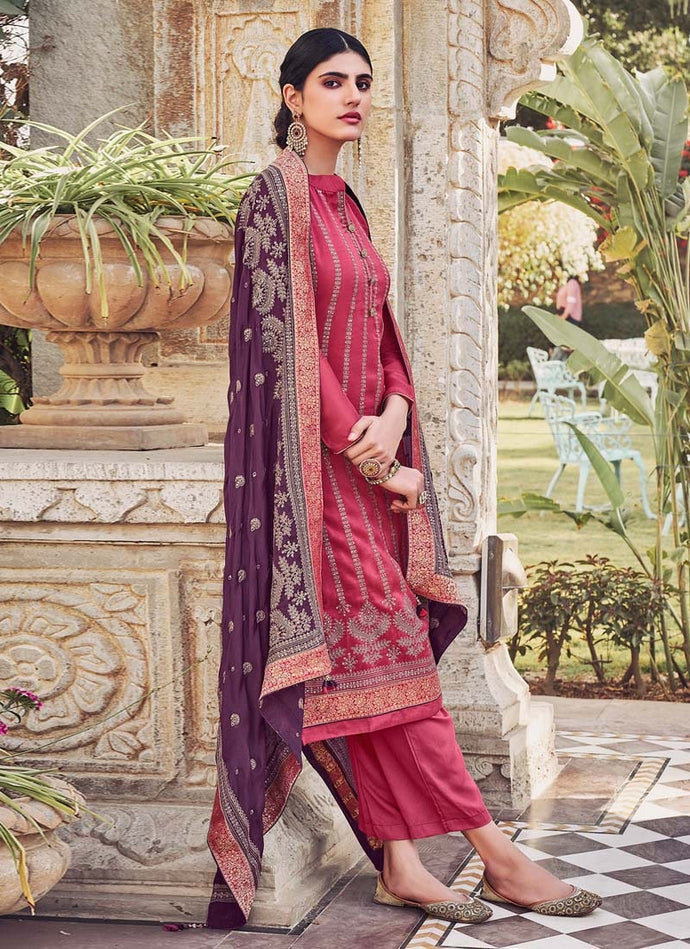 Magenta Pink colored pant style suit with beautiful worked dupatta