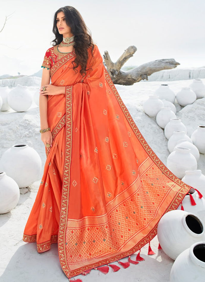 ravishing orange color lace border silk weave saree