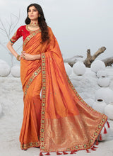 Load image into Gallery viewer, attractive orange color silk weave with lace border saree
