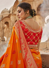 Load image into Gallery viewer, Shop ravishing orange color wedding wear silk weave saree
