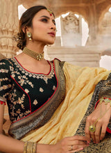 Load image into Gallery viewer, Buy mesmerizing cream color wedding wear silk weave saree
