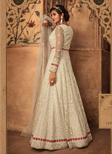 Load image into Gallery viewer, buy designer partywear cream colored stone worked soft net base gown
