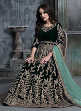 Load image into Gallery viewer, buy Adorable Dark Green color Velvet fabric Zari work Designer Gown
