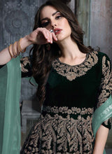 Load image into Gallery viewer, shop Adorable Dark Green color Velvet fabric Zari work Designer Gown
