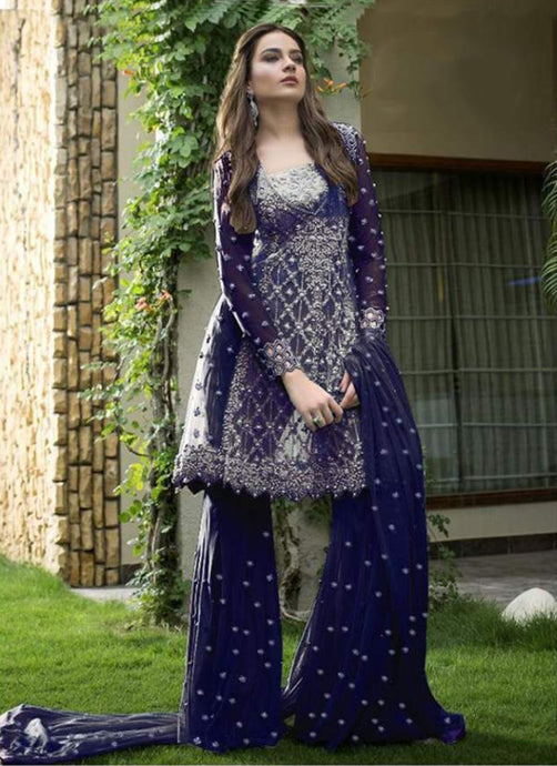 Partywear navy blue colored soft net base Zari and stone worked sharara suit