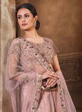 Load image into Gallery viewer, buy peaceful pink colored heavy embroidered soft net base lehenga choli
