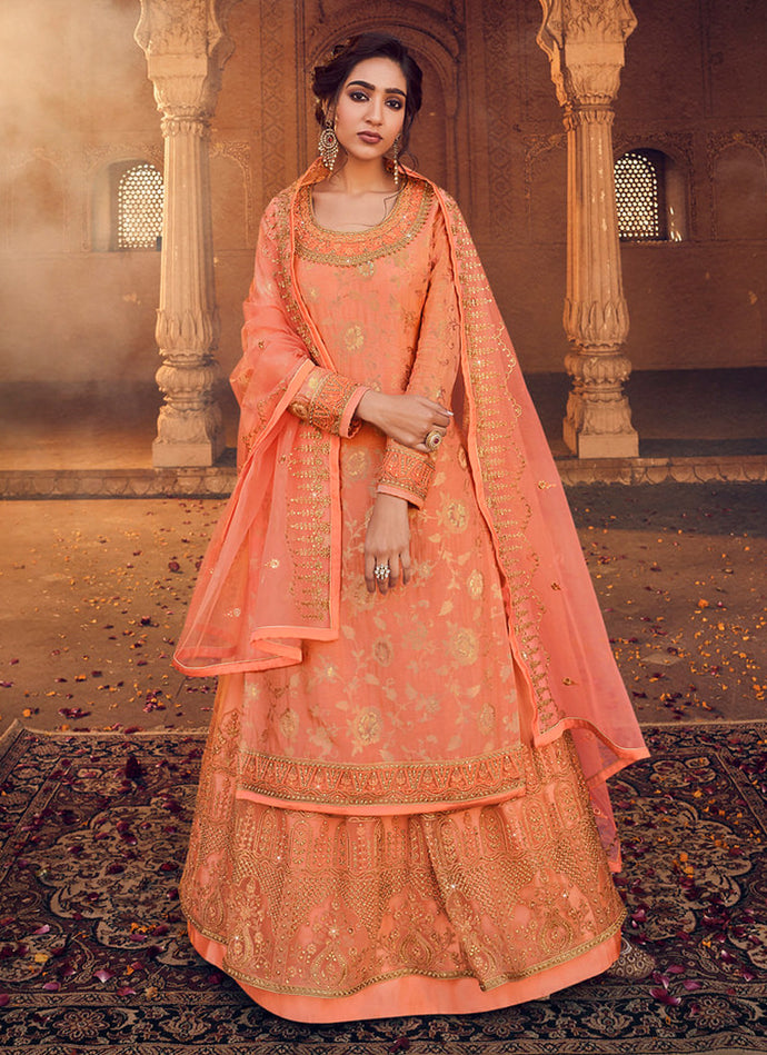 Festive wear Orange silk weave long choli lehenga with stone and Zari work