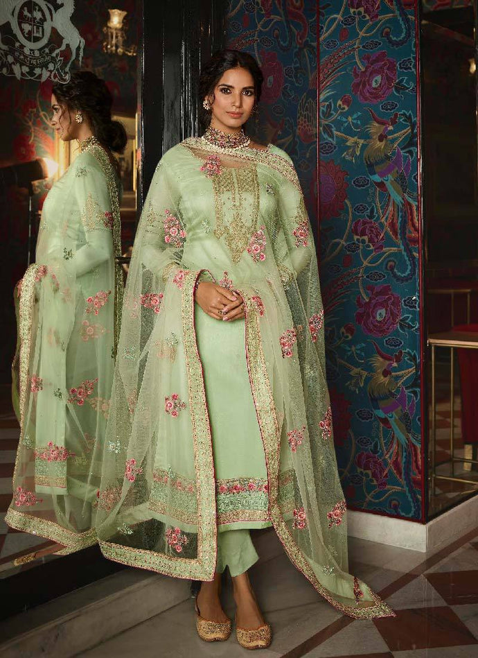 dazzling pista green color silk base embroidery work salwar suit