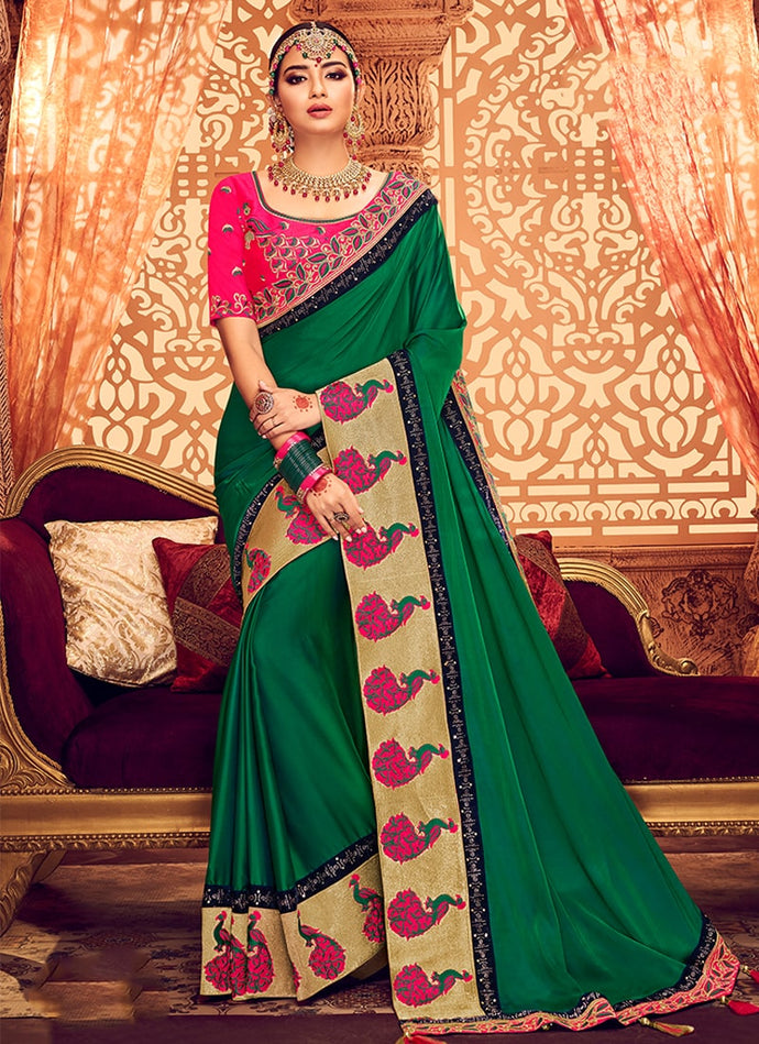traditional green and pink contrast silk weave base saree