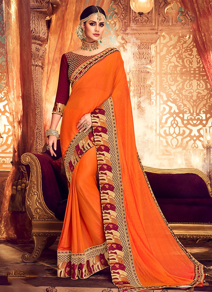 tangy orange and red colored contrast silk weave base saree
