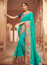 Load image into Gallery viewer, Turquoise Color Silk Base Zari And Lace Work Half And Half Saree
