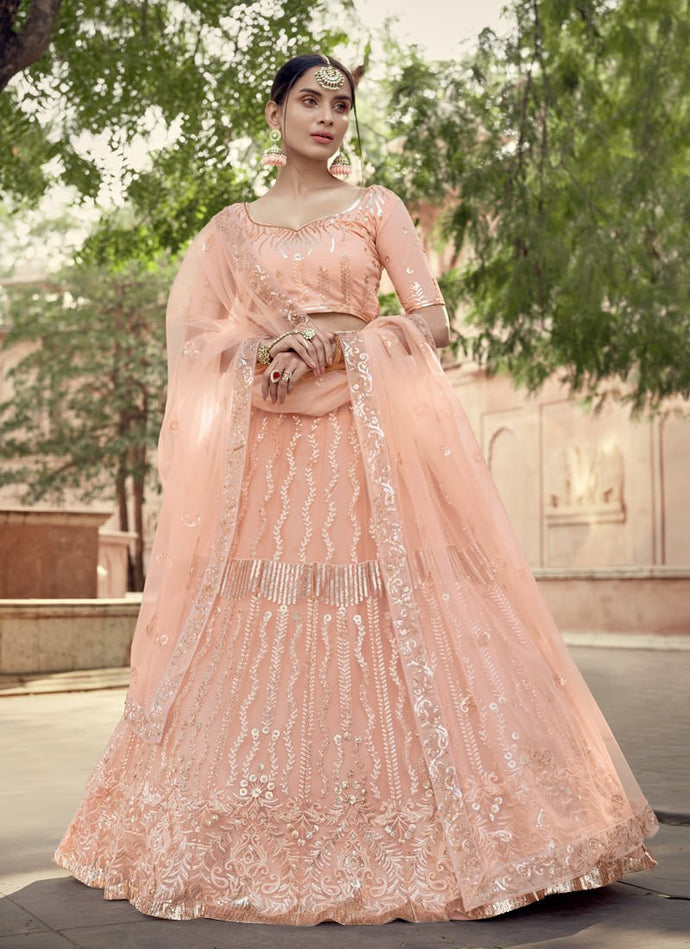 Charming peach color soft net base sequins work lehenga choli