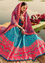Load image into Gallery viewer, buy pink and aqua blue colored printed silk base lehenga choli
