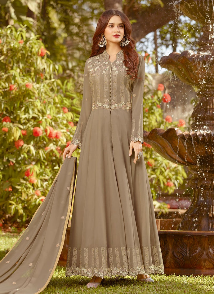 light pastel brown colored partywear embroidered slit cut suit