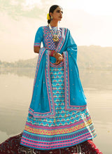 Load image into Gallery viewer, partywear aqua blue colored printed silk base lehenga choli
