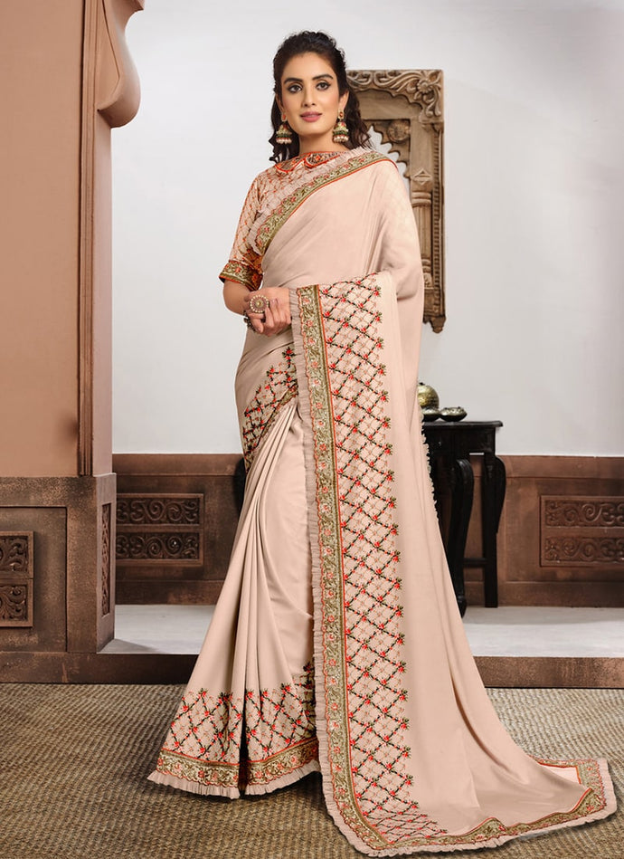 Fabulous Nude pink color Silk base Saree with Zari and Resham work