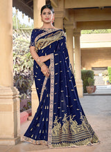 Load image into Gallery viewer, Boat neckline Silk base Navy Blue color Silk weave and Zari work Saree
