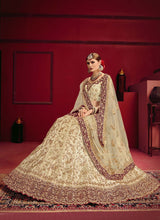 Load image into Gallery viewer, buy Beautiful cream colored silk base designer Lehenga Choli
