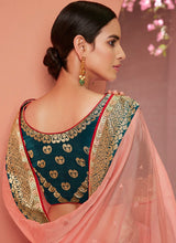 Load image into Gallery viewer, Buy Festive wear light peach colored organza based saree

