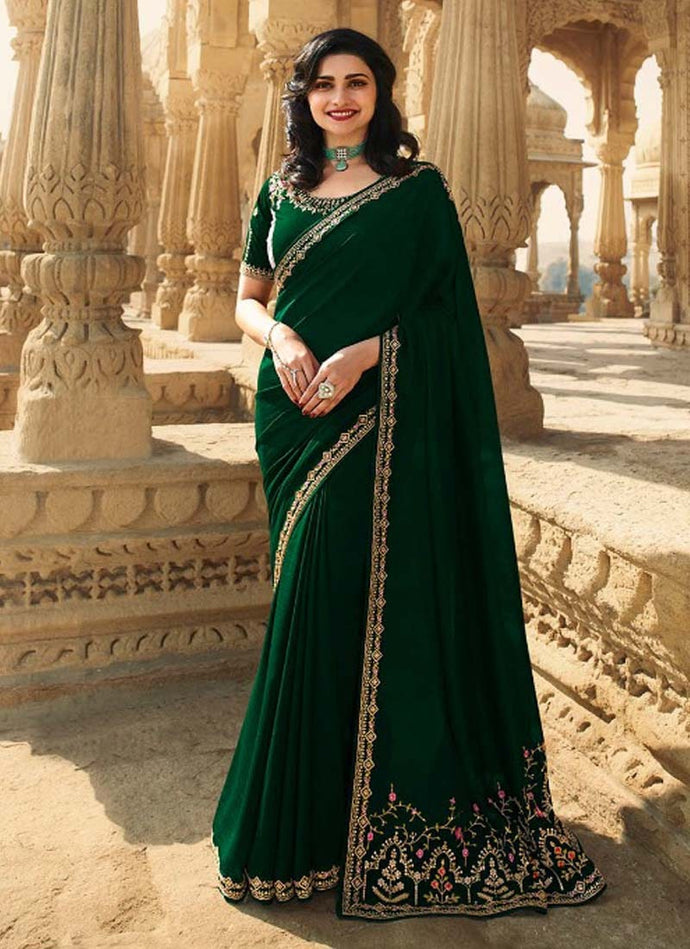 memorable dark green colored silk base designer saree