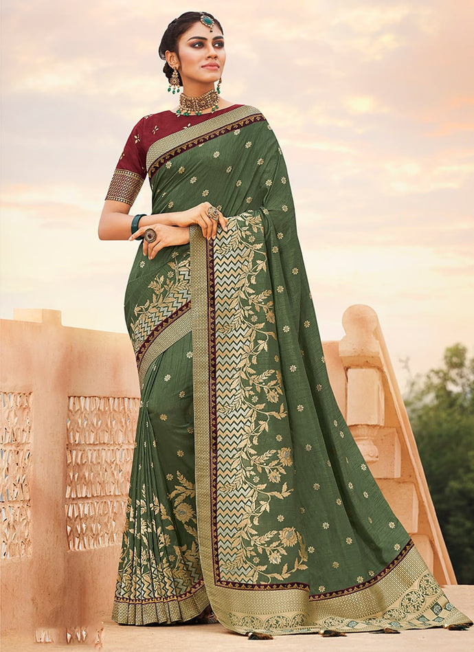 Traditional olive green colored silk weave saree