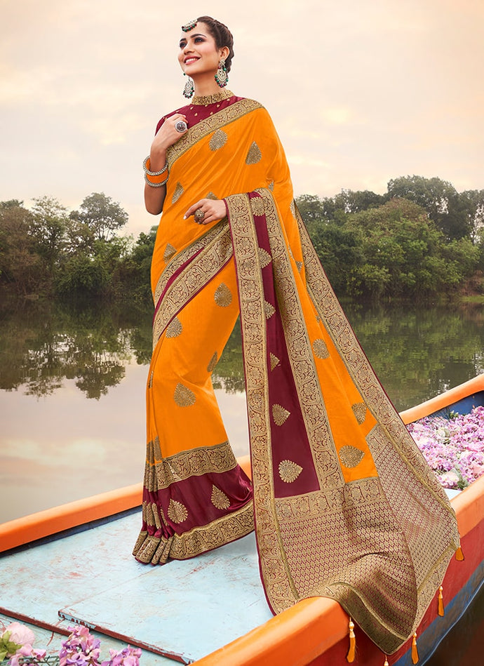 popular tangy orange colored silk weave saree