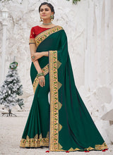 Load image into Gallery viewer, fabulous green colored weddingwear silk weave saree
