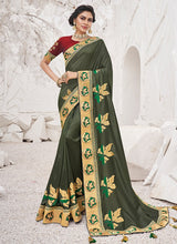Load image into Gallery viewer, outstanding olive green colored partywear silk weave saree
