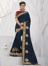 Load image into Gallery viewer, Chic navy blue colored partywear silk weave saree
