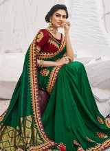 Load image into Gallery viewer, Shop gorgeous green colored partywear silk base saree
