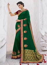 Load image into Gallery viewer, gorgeous green colored partywear silk base saree
