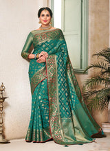 Load image into Gallery viewer, magical wedding wear green colored silk weave saree
