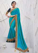 Load image into Gallery viewer, fantastic aqua blue colored partywear silk base saree
